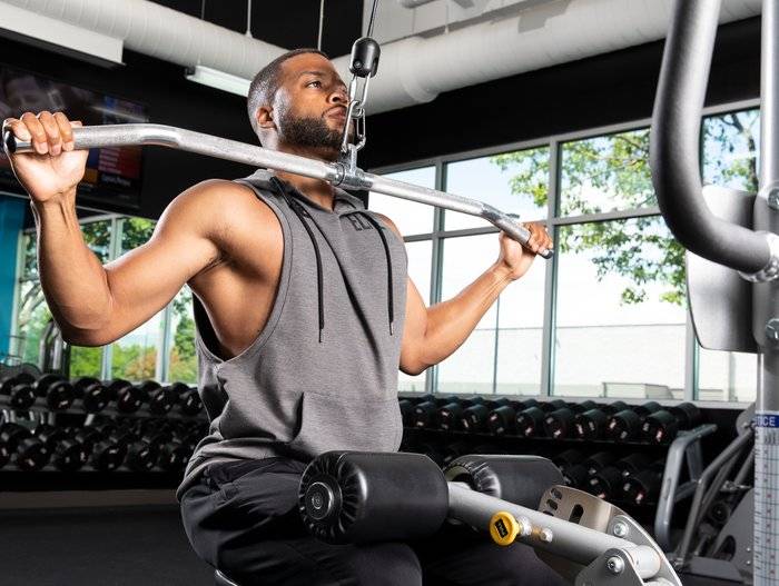 Гребной тренажер: какие мышцы работают в упражнении, польза и вред от тренировок